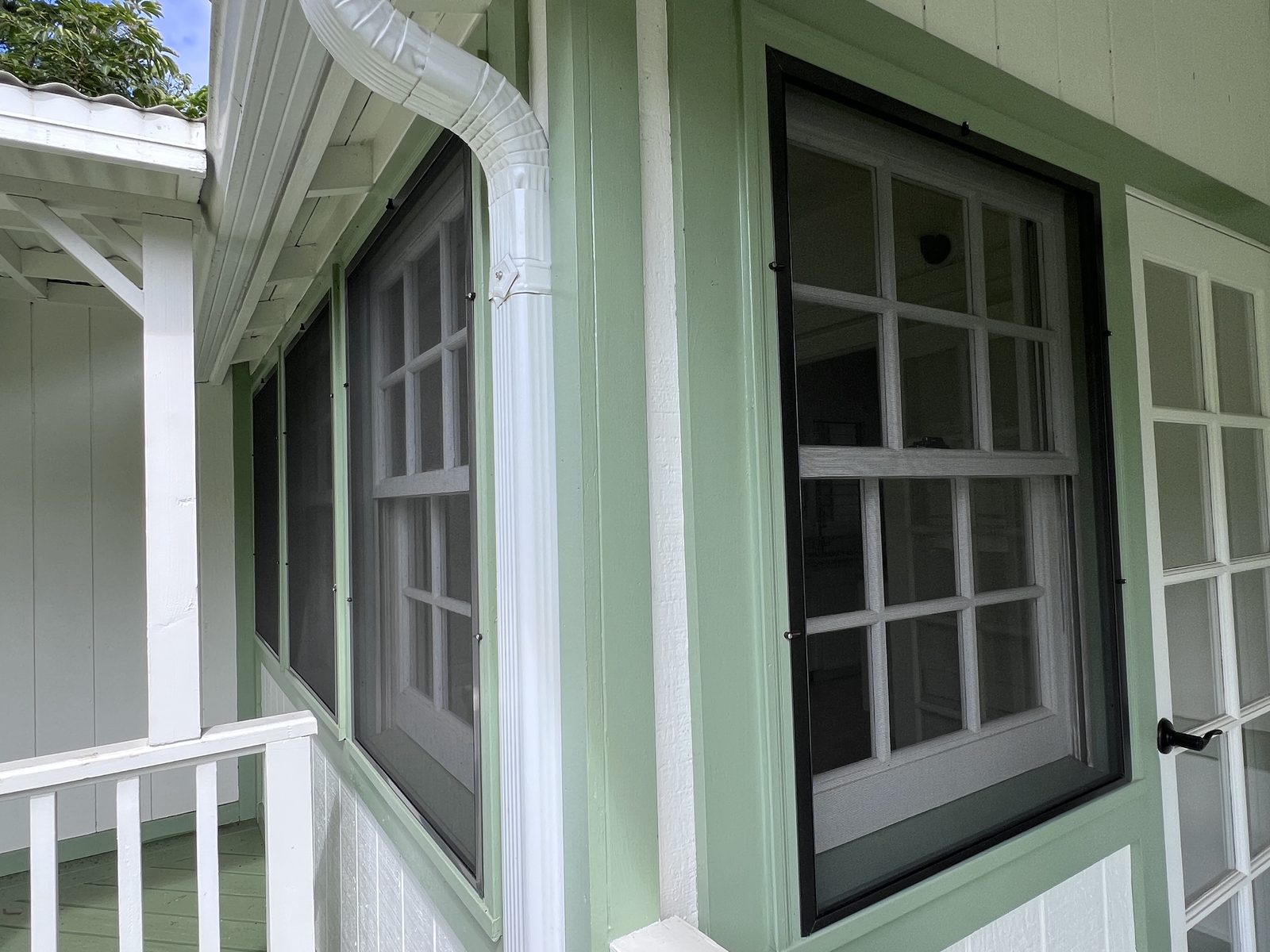 Finished window screens fitted on a Maui home